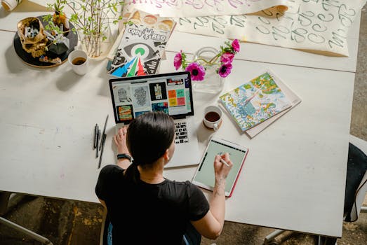 a woman working on her laptop